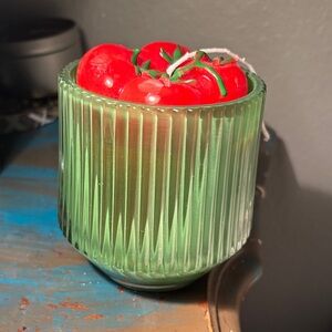 Green Ribbed Glass Candle with Red Tomato Decor